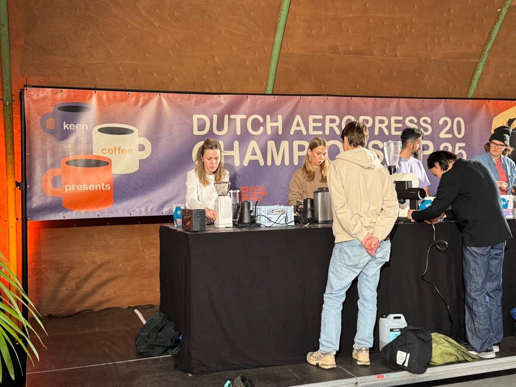 Competitors brewing on stage at the Dutch AeroPress Championship